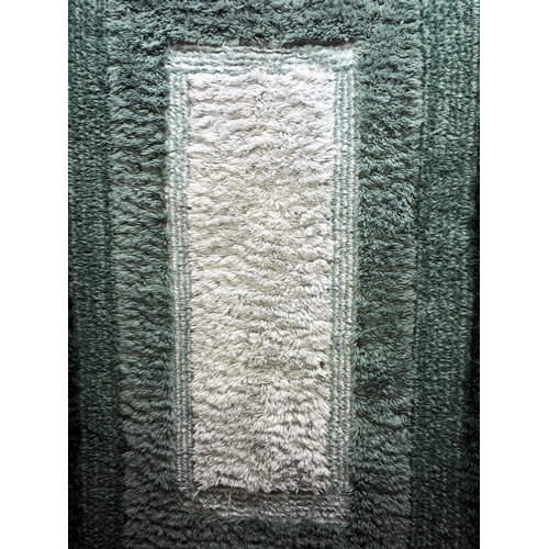 300 - A deep pile variegated green rug (188cm long x 130cm wide) (COLLECT ONLY)