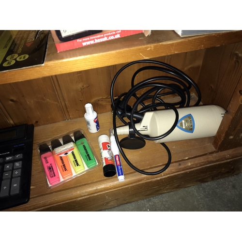 310 - A quantity of sundry electrical & electronic goods including phones, radio's & a massager etc. (3 sh... 