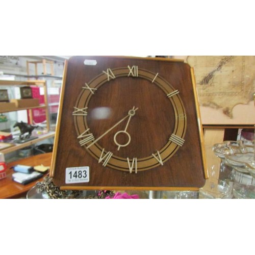 1483 - An art deco wall clock.  (no wieghts)