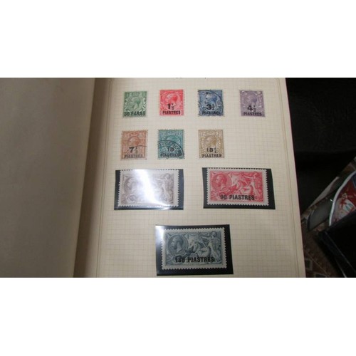 1495 - Four albums of assorted stamps.