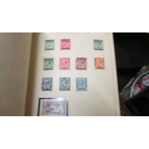 1495 - Four albums of assorted stamps.