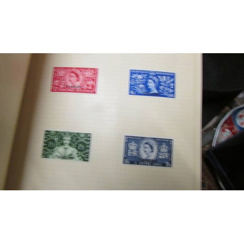 1495 - Four albums of assorted stamps.