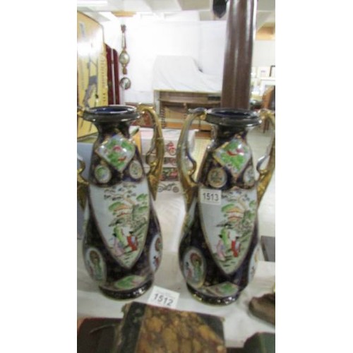 1513 - A pair of Chinese twin handled vases.