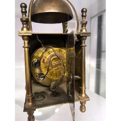 320 - A Smiths electric brass lantern clock