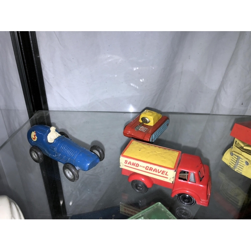 330 - A selection of tin plate and plastic friction toys, including Triang, tank, jeep, ambulance etc