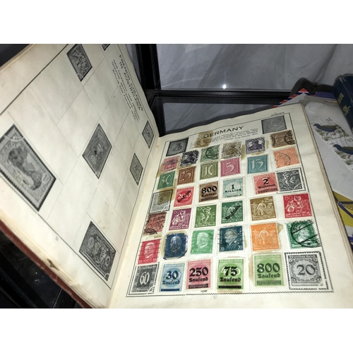 331 - 4 small stamp albums and a quantity of loose stamps