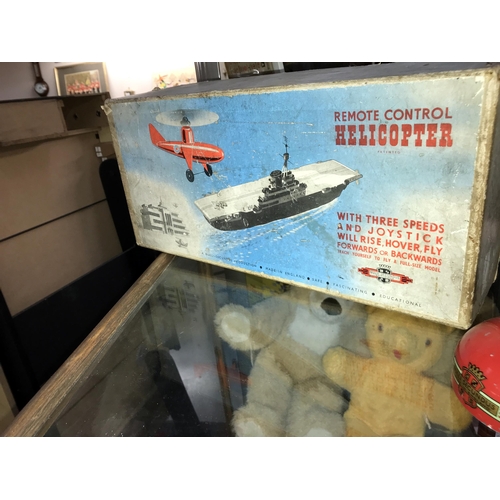 333 - A boxed vintage tinplate remote control helicopter by Nulli Secundus. Made in England