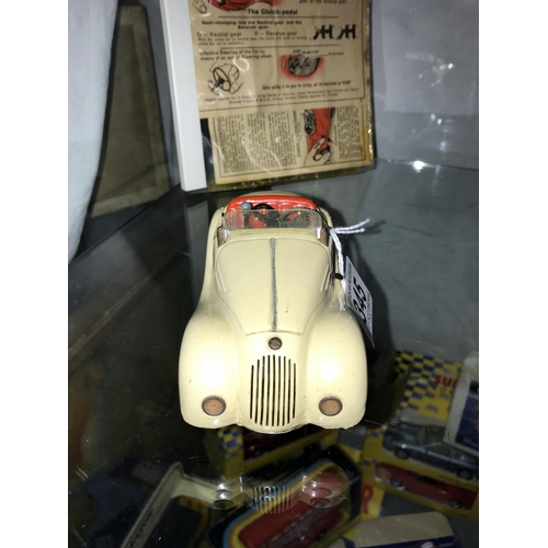 345 - A Schuco Examico 4001 clockwork car with original key