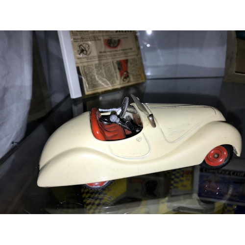 345 - A Schuco Examico 4001 clockwork car with original key