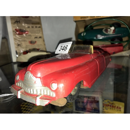 346 - A Marx fire chief car and a boxed Empire made Vanwall racing car, battery operated