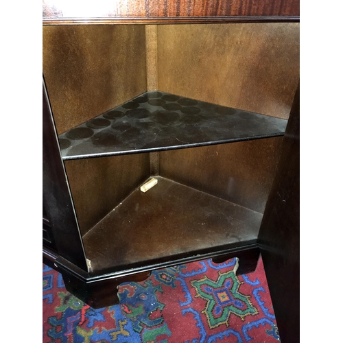 350 - A dark wood stained corner cupboard with cut glass door panel. 70cm x49cm x Height 184cm (COLLECT ON... 