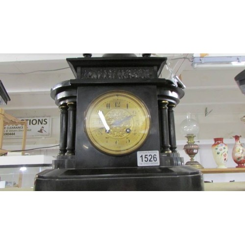 1526 - A Victorian black marble mantel clock with two Grecian style side pieces.