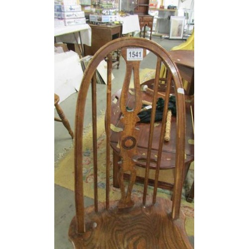 1541 - A set of four old farmhouse chairs including two carvers.