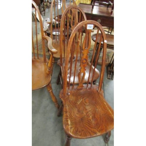 1541 - A set of four old farmhouse chairs including two carvers.