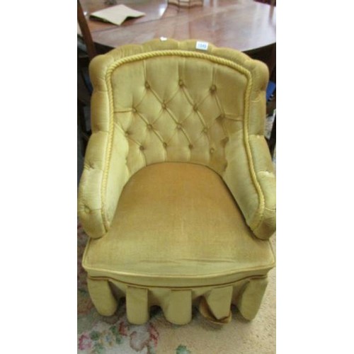 1549 - A deep buttoned easy chair.