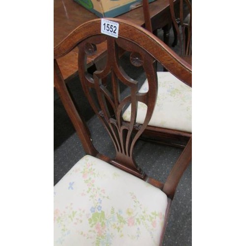 1552 - A set of six Georgian dining chairs.