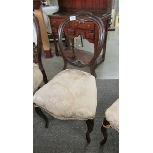 1553 - A set of four Victorian mahogany cabriole leg chairs.