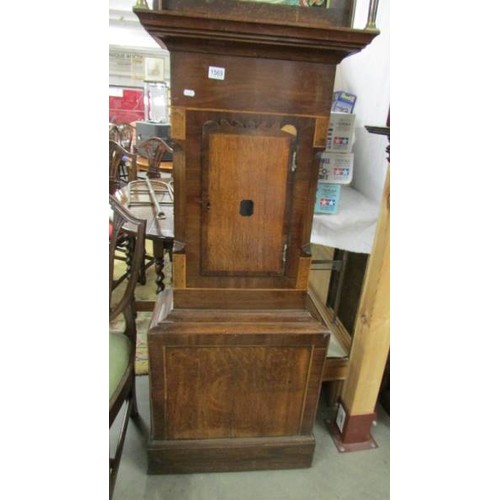 1569 - An oak cased Grandfather clock.