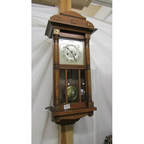 1575 - An early 20th century wall clock.