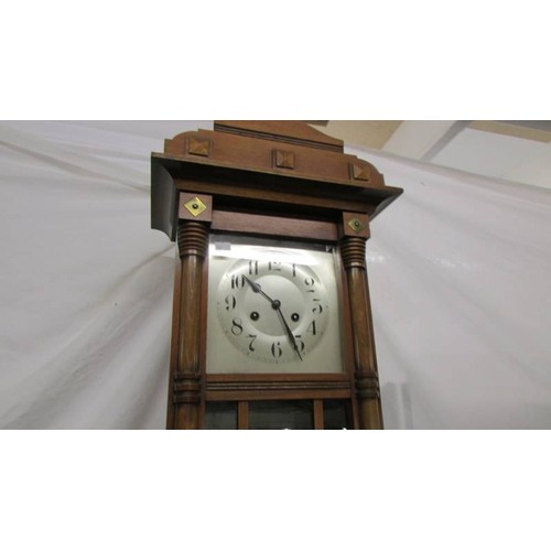 1575 - An early 20th century wall clock.