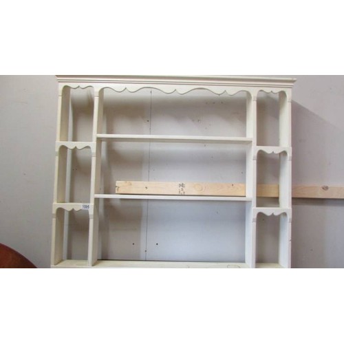 1595 - A painted plate rack.