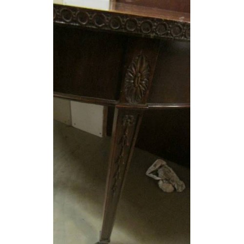 1613 - A mahogany D shaped table.