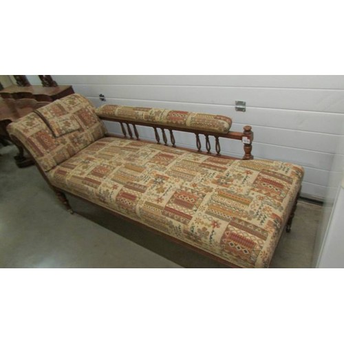 1616 - A mahogany chaise longue.