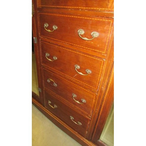 1621 - An Edwardian mahogany inlaid combination wardrobe.