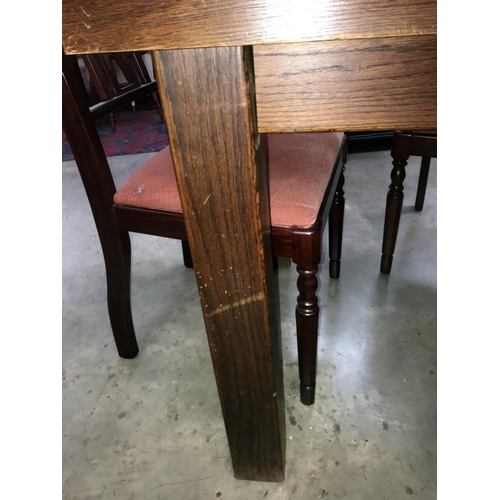 377 - A heavy solid wood dining table. Length 140cm x Width 79cm x Height 78cm * Collect Only*