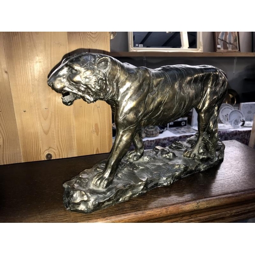 395 - A bronze effect resin tiger figurine, a bronze effect planter golden eagle, etc