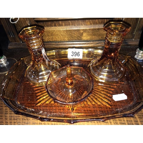 396 - Pair of continental green glass vases with gold decoration and amber glass dressing table set