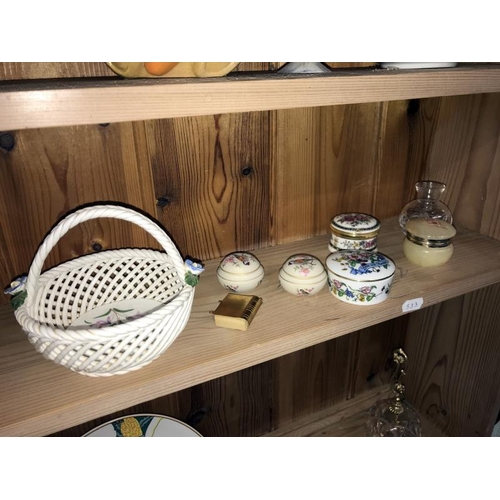 399 - A quantity of miscellaneous collectables including Isle of White sand ornaments etc. 3 shelves