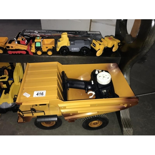 416 - A good selection of battery operated JCB construction vehicles, Porsche & TTA remote central toys (w... 