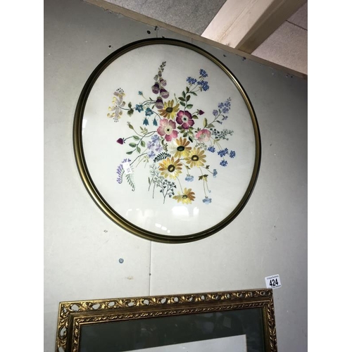 424 - 2 gilt framed & glazed floral embroideries from late 1950's, 1 oval & 1 rectangular