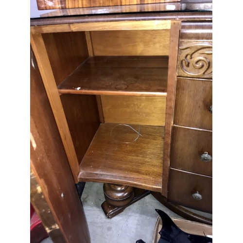 427 - A 1930's/50's oak sideboard