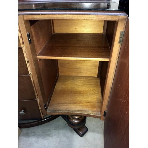 427 - A 1930's/50's oak sideboard