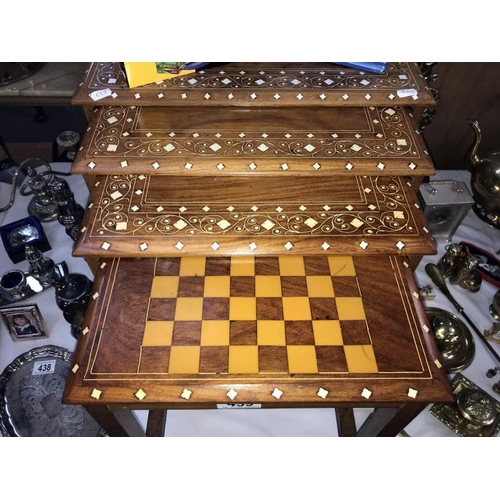 439 - An Indian inlaid nest of 4 teak tables