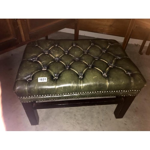 1631 - A deep buttoned green leather foot stool