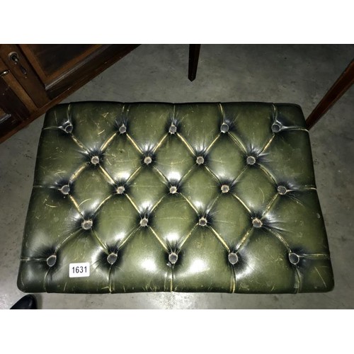 1631 - A deep buttoned green leather foot stool