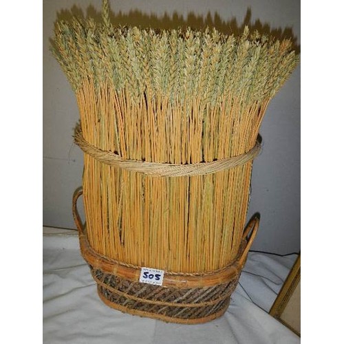 505 - A tall basket of wheat.