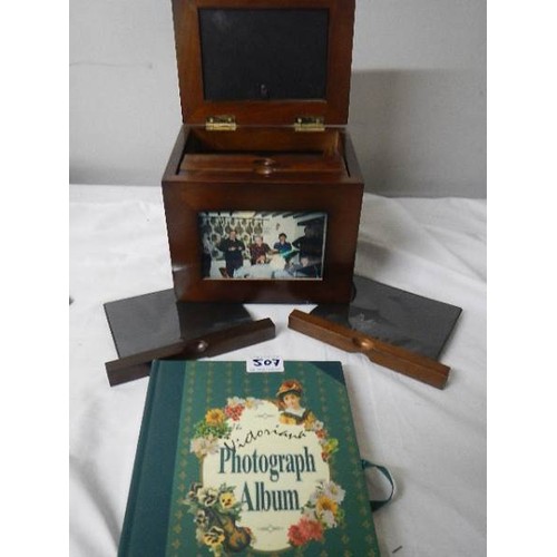 507 - An unusual photo storage box and a photo album.