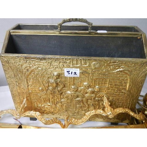 512 - A brass magazine rack and other brass ware.