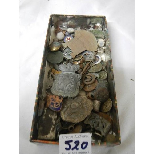 520 - A mixed lot of detector finds including badges etc.,