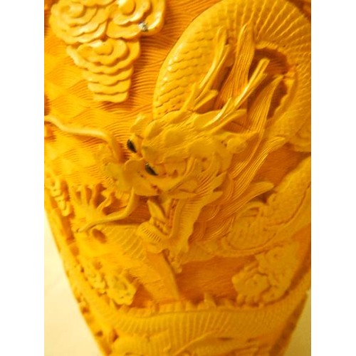 530 - A Chinese style vase with dragons.