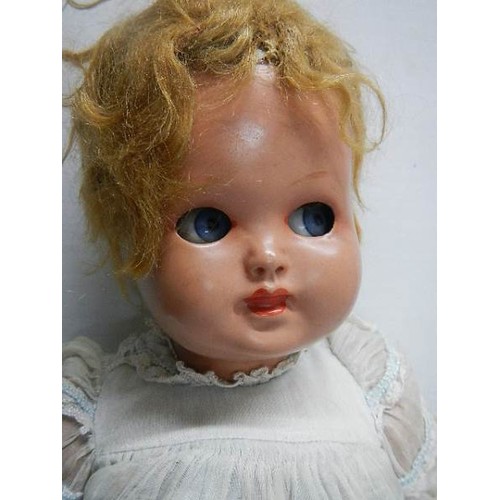 532 - A vintage doll. A/F