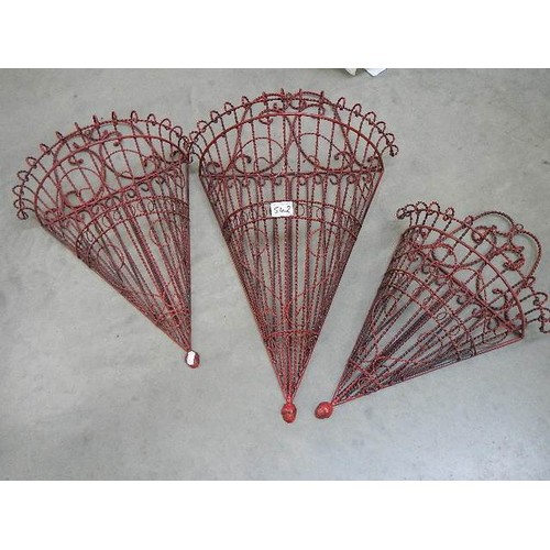 542 - Three good wire wall hanging plant holders.