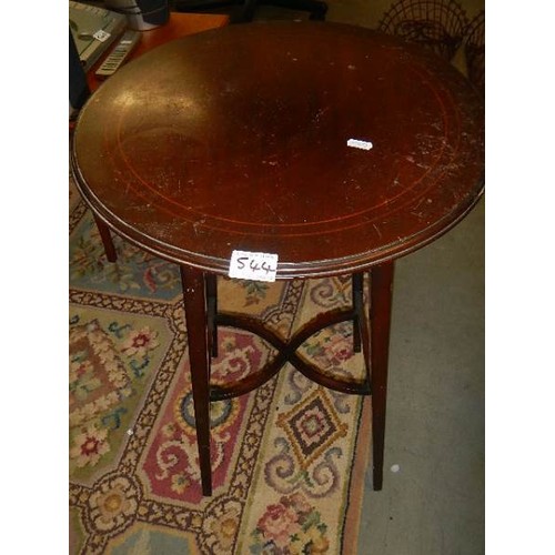 544 - A circular inlaid table.