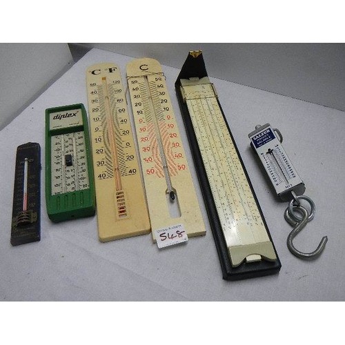 548 - A mixed lot of thermometers, scales and a ruler.