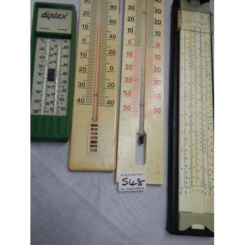 548 - A mixed lot of thermometers, scales and a ruler.