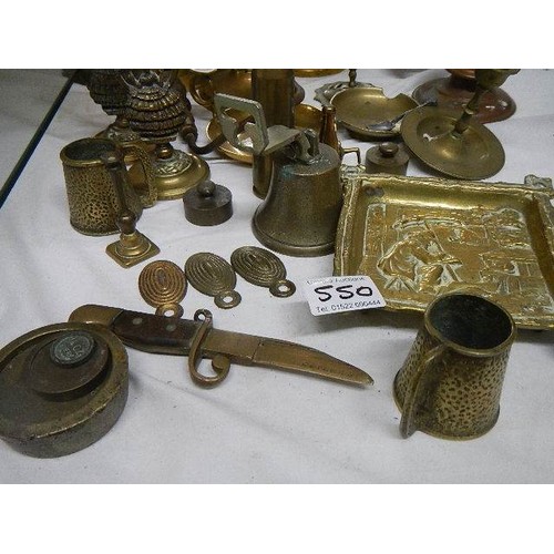 550 - A mixed lot of brass ware including candlesticks, pressure gauge etc.,